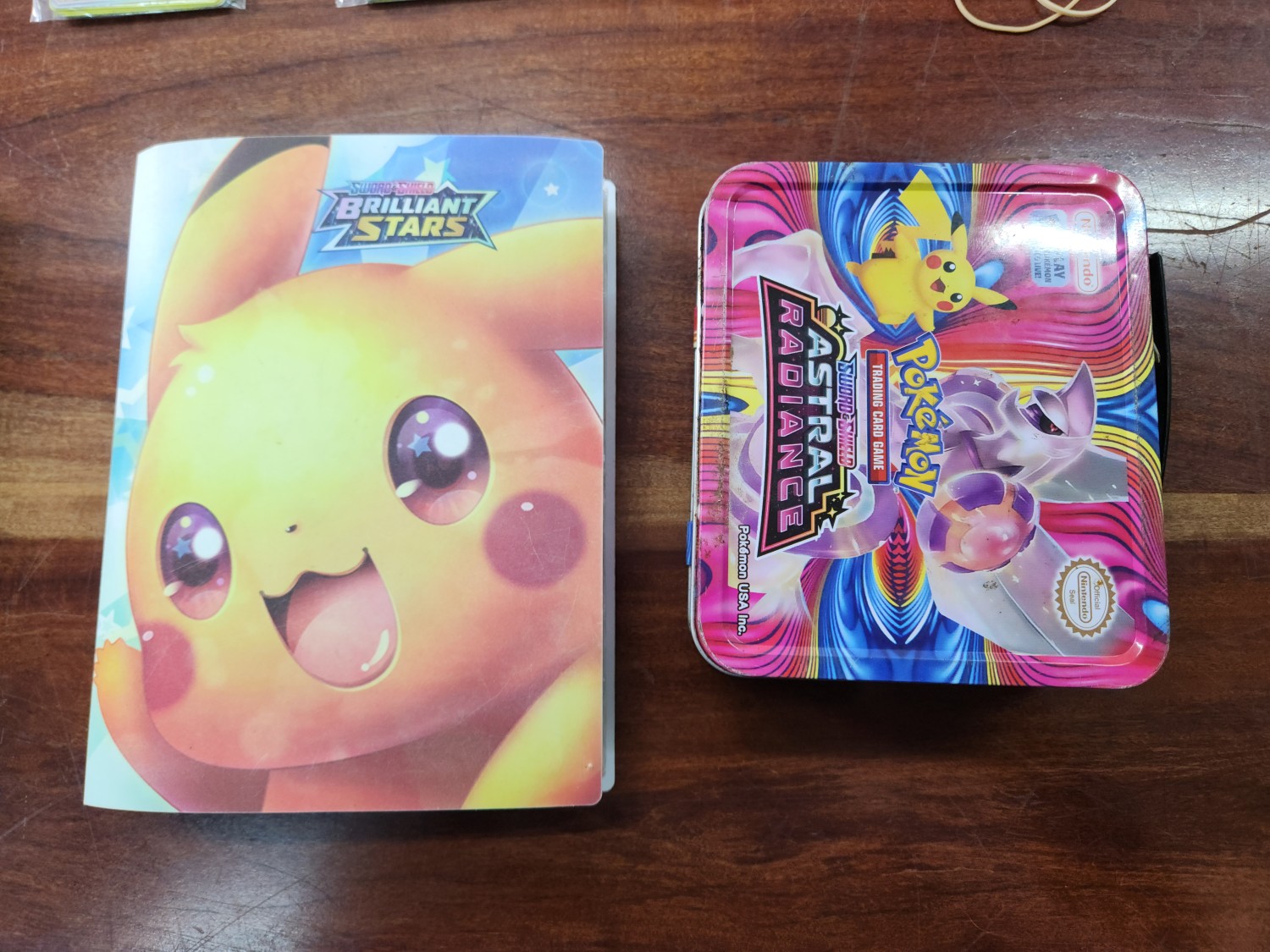 Pokemon Collectable Cards in Album with Tin